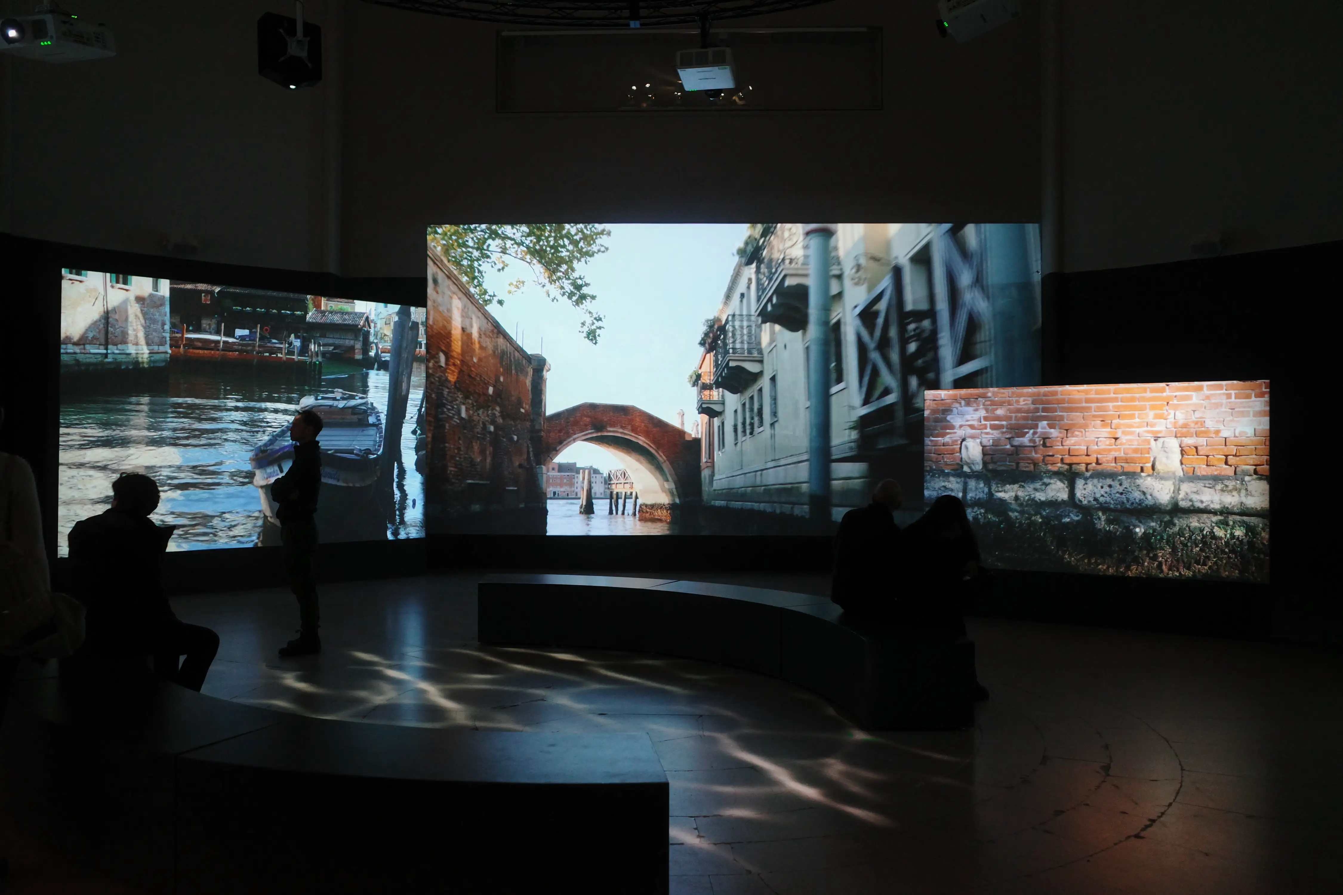 Projected canal scenes in a museum installation